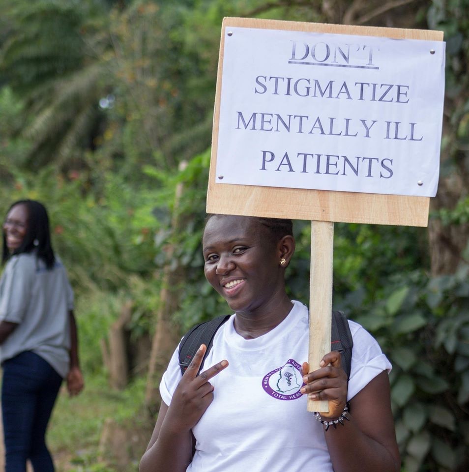 Image may contain: 1 person, smiling, outdoor